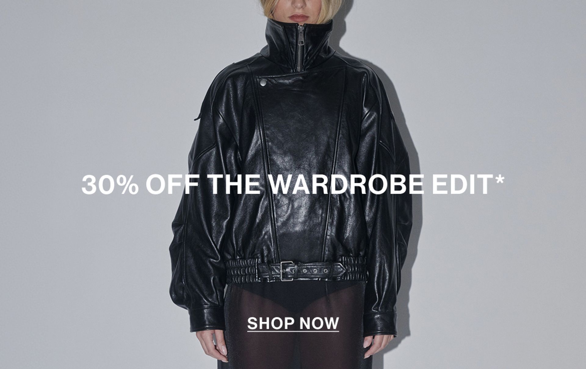 Model wearing a black leather jacket with text overlay: "30% OFF THE WARDROBE EDIT"