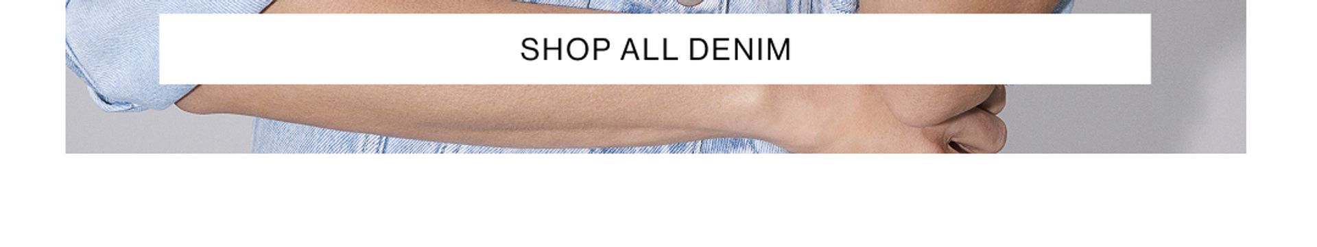 Woman wearing a denim jacket with text overlay which states "SHOP ALL DENIM"