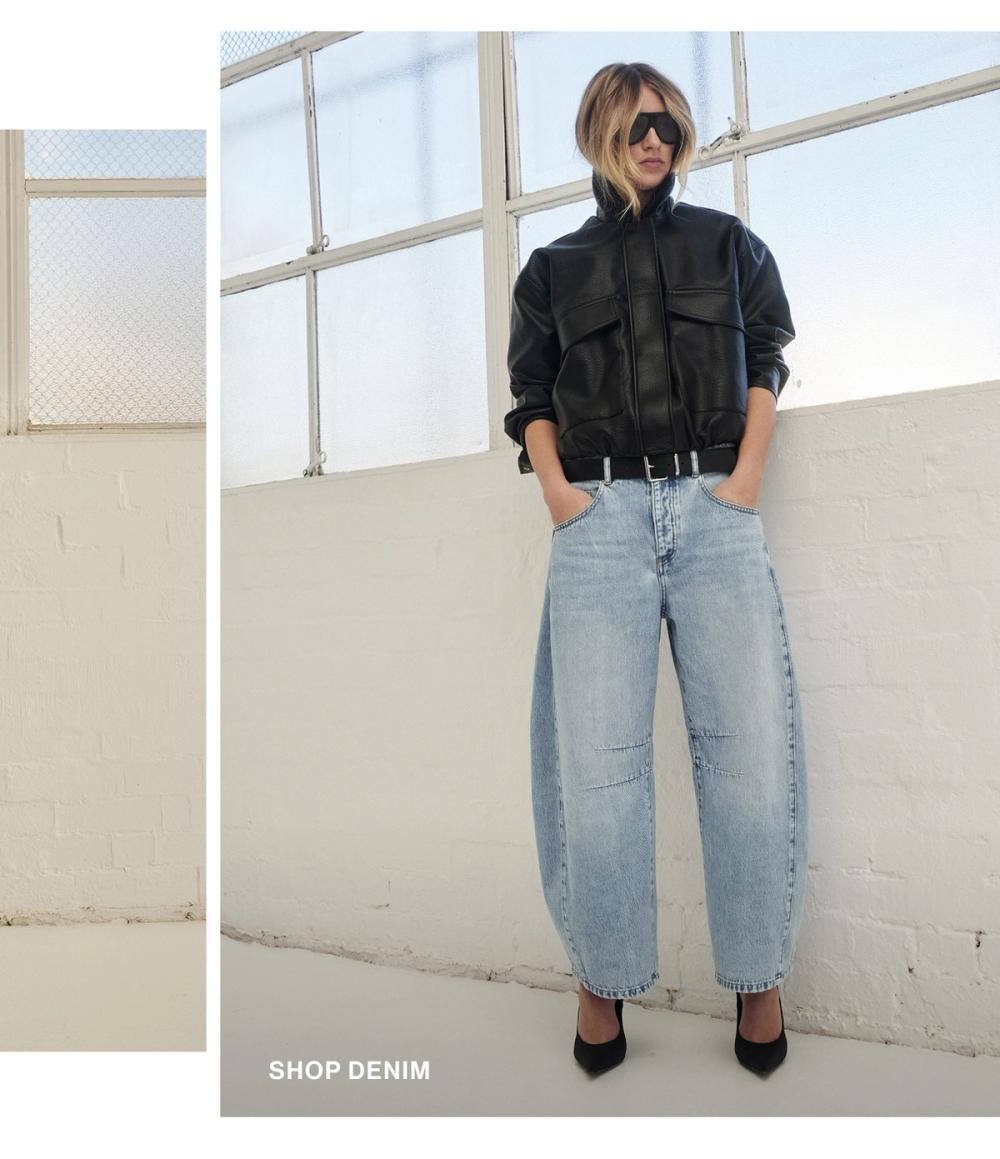 Woman posing in a matching denim set
