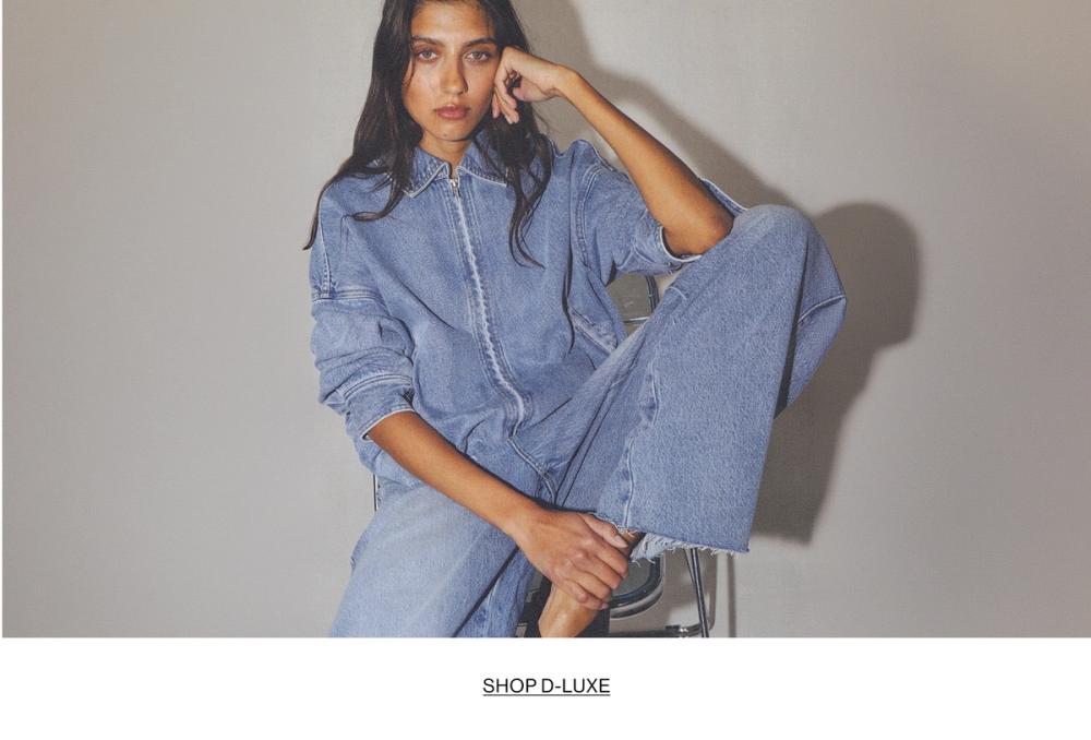 Woman in double denim with text that states "SHOP D-LUXE"