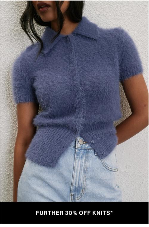Woman wearing a blue knit jumper with text overlay "further 30% off knits"