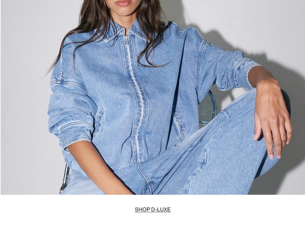Woman in double denim with text that states "SHOP D-LUXE"