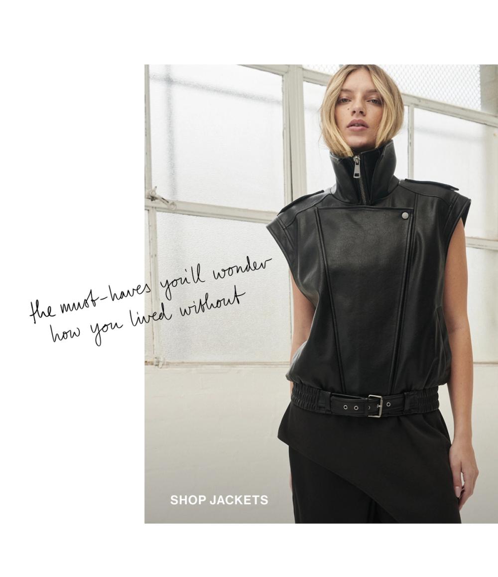 Woman standing in a brown funnel neck jacket