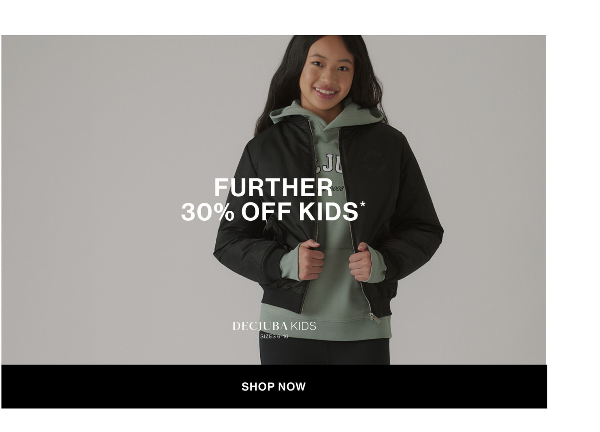 Model wearing a green hoodie and black bomber in a studio. Text reads 30% off KIDS.