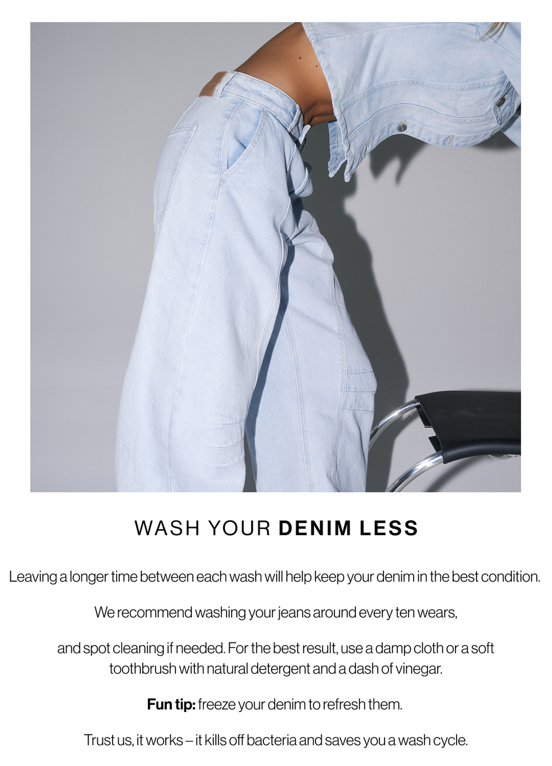 Model in a light-wash denim shirt leaning forward against a chair, shown in profile. Heading reads “Wash Your Denim Less” with text explaining to reduce washing frequency.
