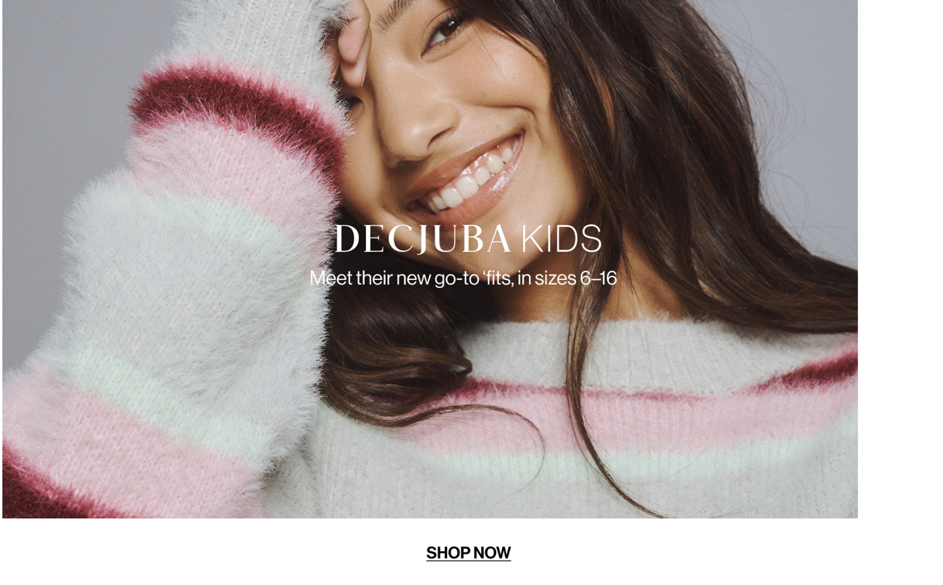 Model wearing a stripe knit in a studio. Text reads SHOP DECJUBA KIDS