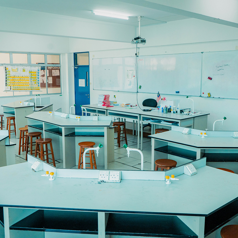 Invictus International School Malaysia Spring Hills Campus science laboratory with hexagonal lab benches and gas outlets