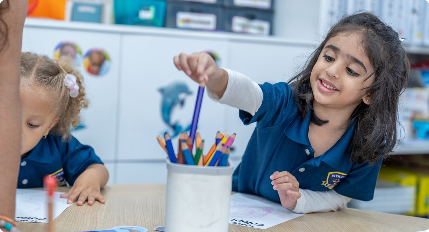 Young children at Horizon Hills Invictus International School Malaysia engaging in creative activities during Early Years learning.