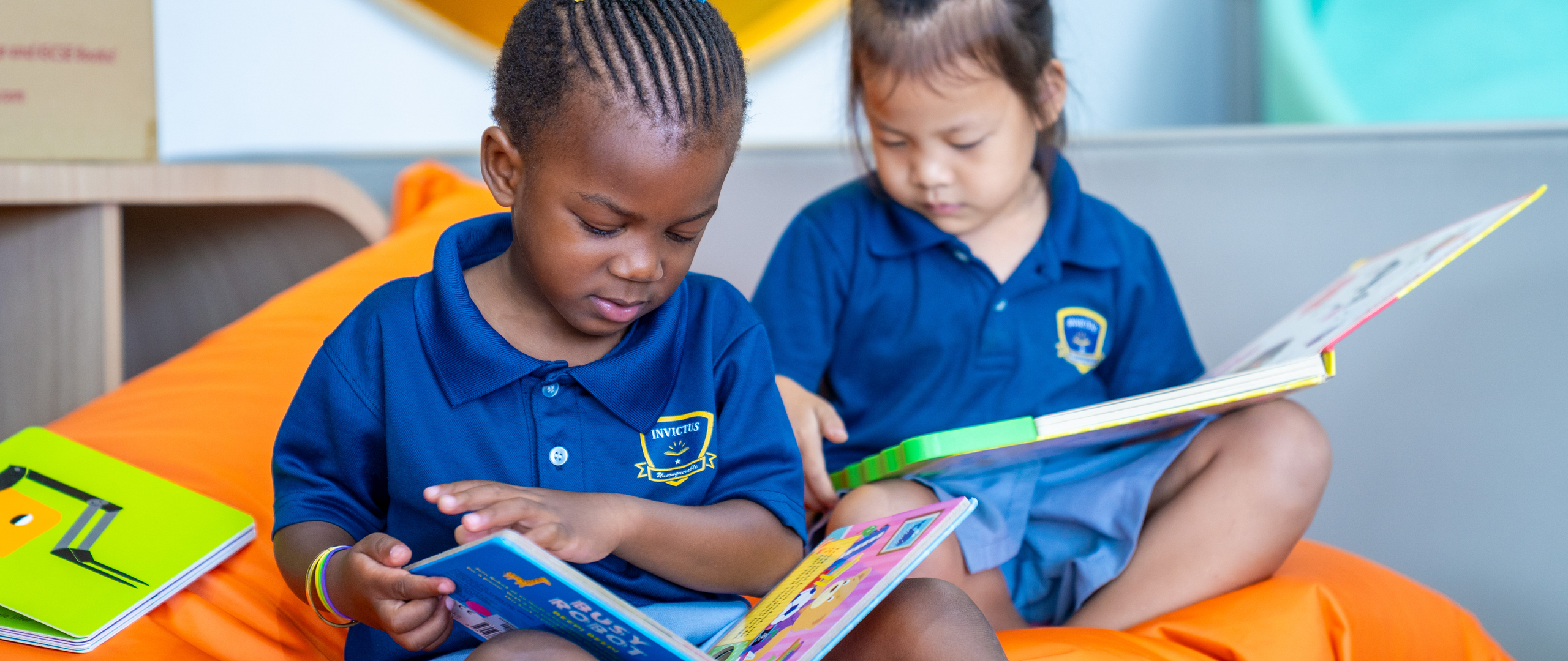 Students at Invictus Horizon Hills Malaysia enjoying outdoor activities with teachers, reflecting the joyful and diverse spirit of the campus.