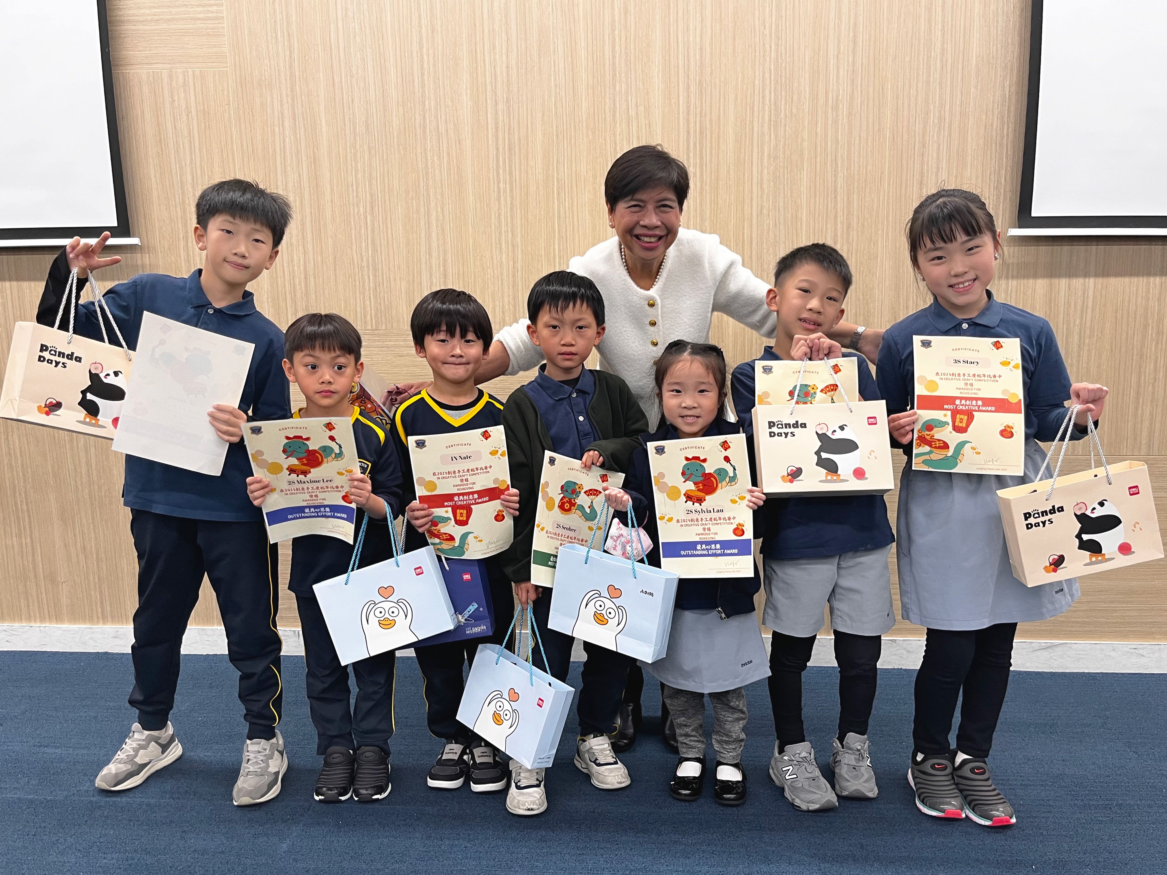 Group of children outdoors writing reflections