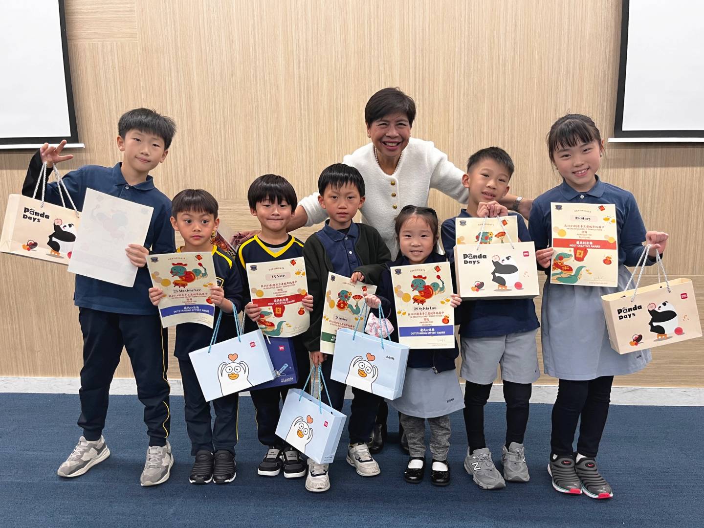 Group of children outdoors writing reflections