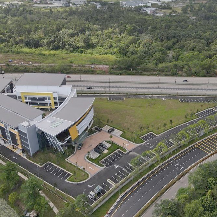 Aerial view of Horizon Hills Invictus International School Malaysia showcasing its campus layout and surrounding greenery.