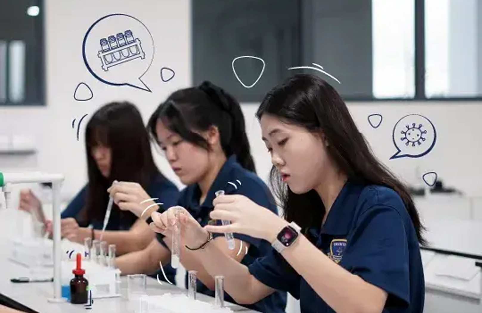 Secondary school students work attentively with test tubes during a science experiment in a modern laboratory at Invictus International School.