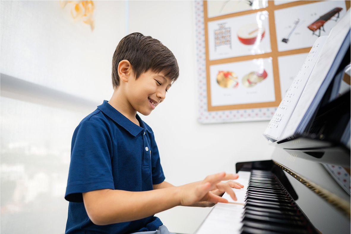 Invictus Student playing piano