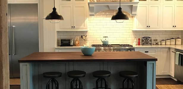 White kitchen with island.