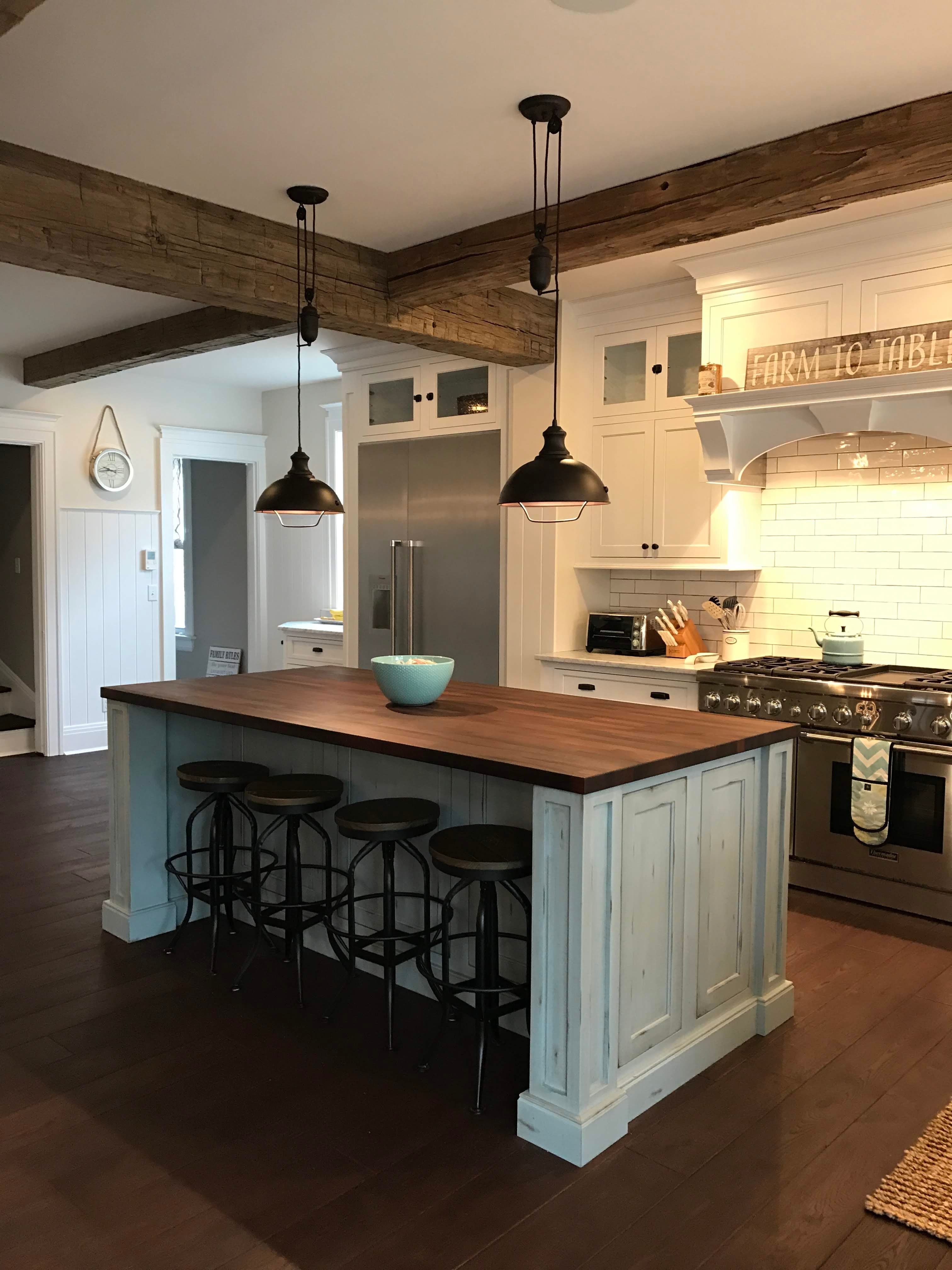 White Inset Cabinetry with Subway Tile Backsplash by Dana Snyder