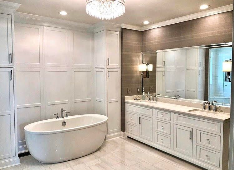 Painted White Cabinetry with Custom Wainscot Paneling by Dana Snyder