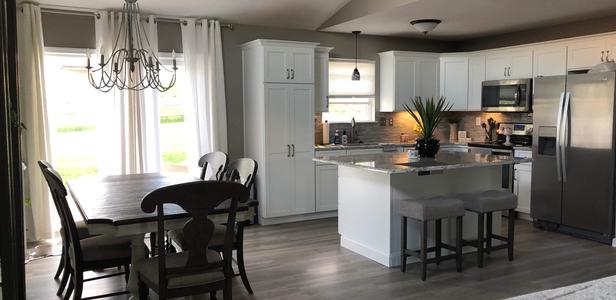 White kitchen with island.