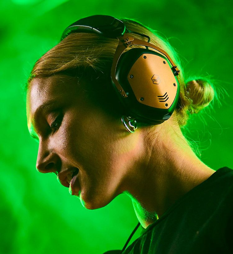 Woman wearing bluetooth V-Moda headphones