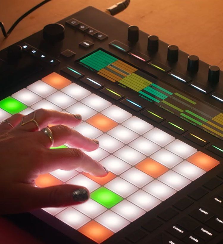 Close up of girl's hand playing Ableton sampler