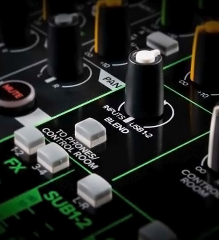 Close up of knobs on Mackie mixer