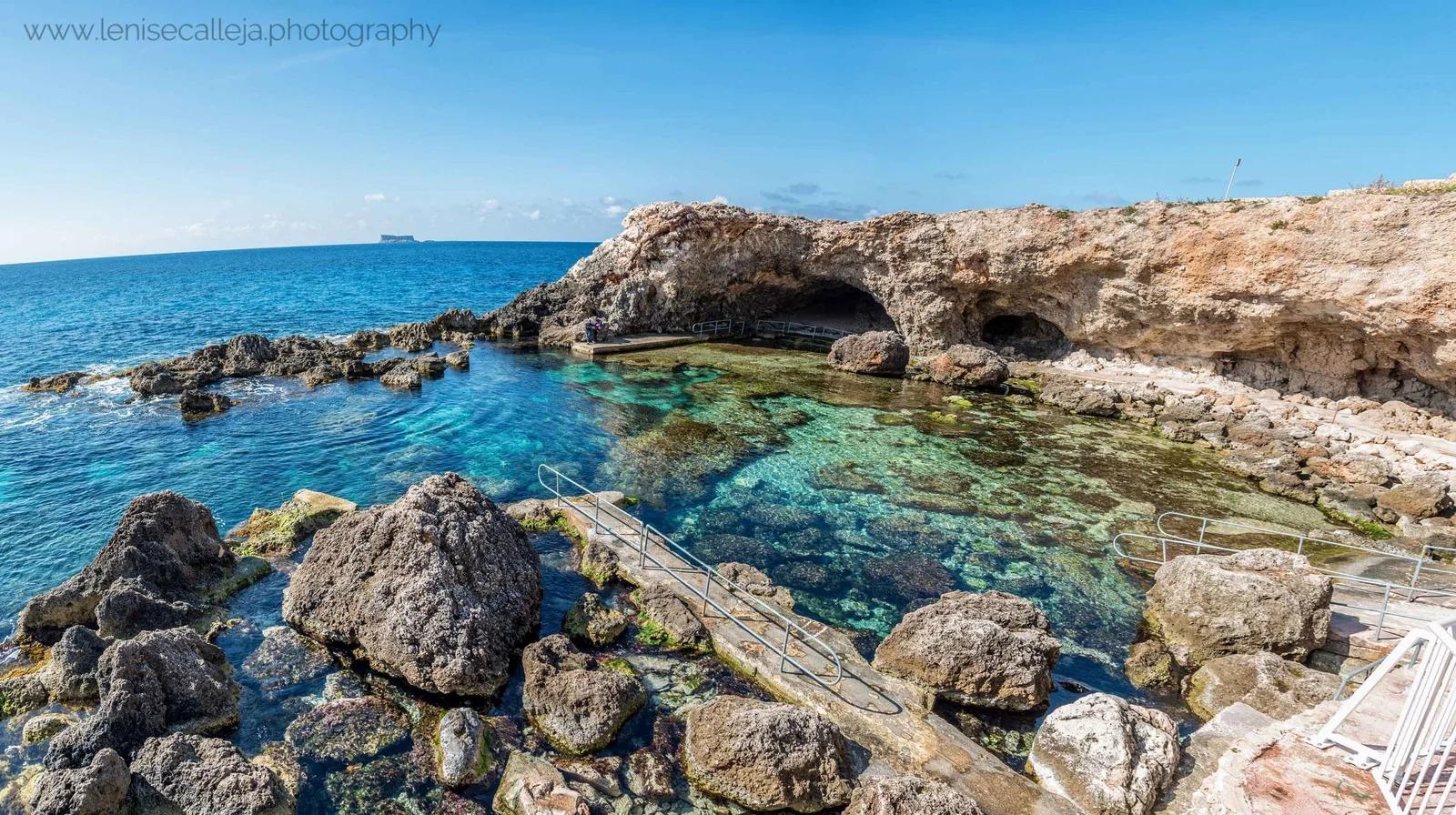 Natural rock pool and sea caves on the South Malta coastline