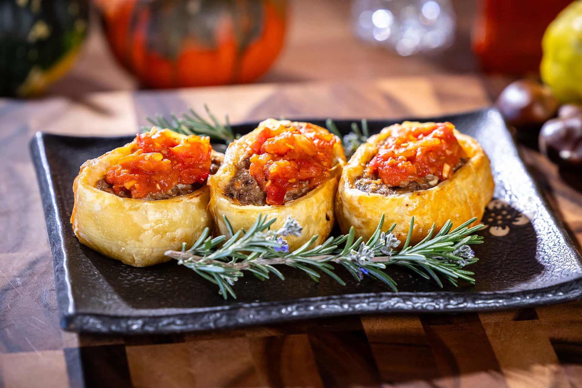 Lamb and rosemary sausage rolls with tomato relish