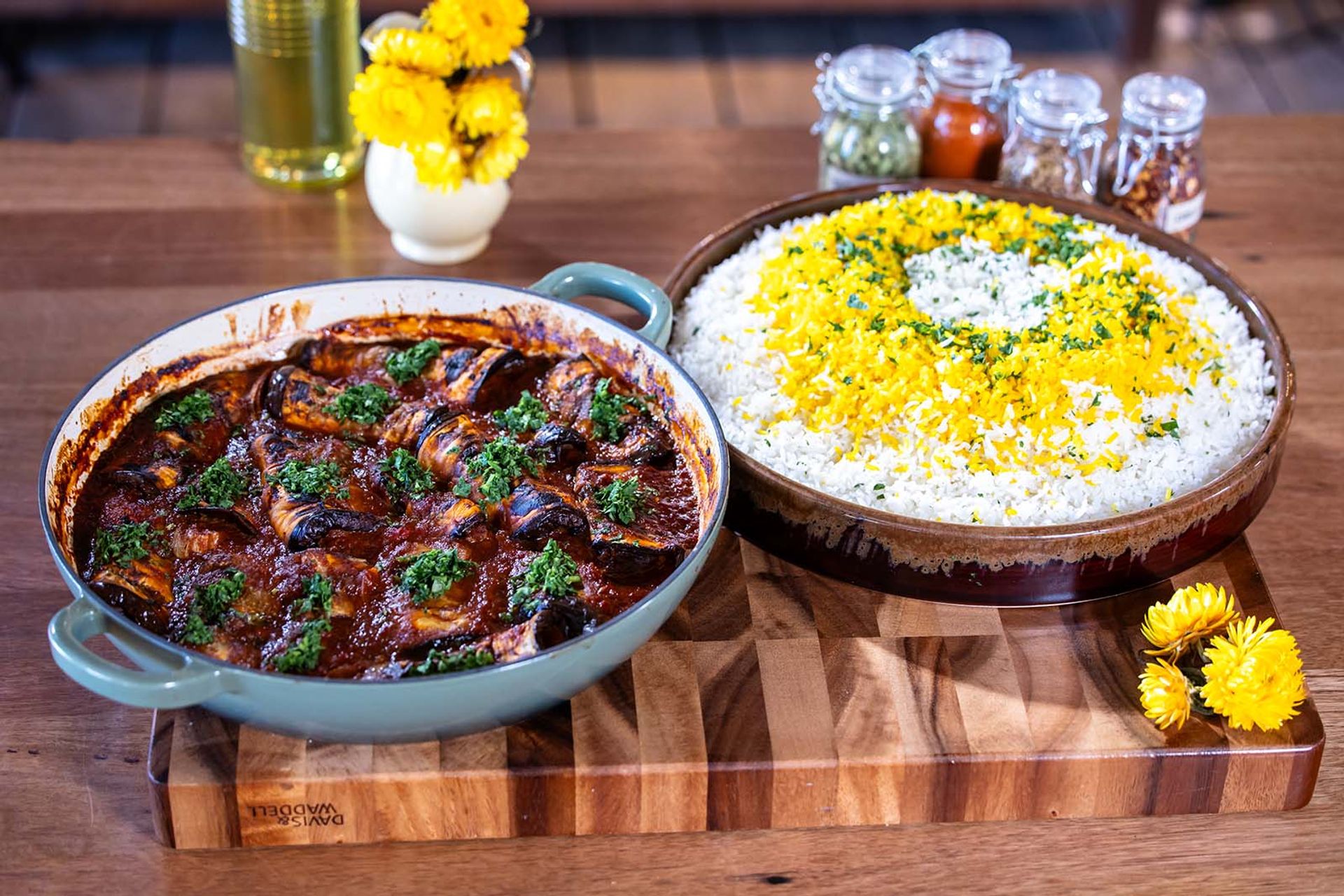 Tepsi Batinjal in a serving dish with a side of rice