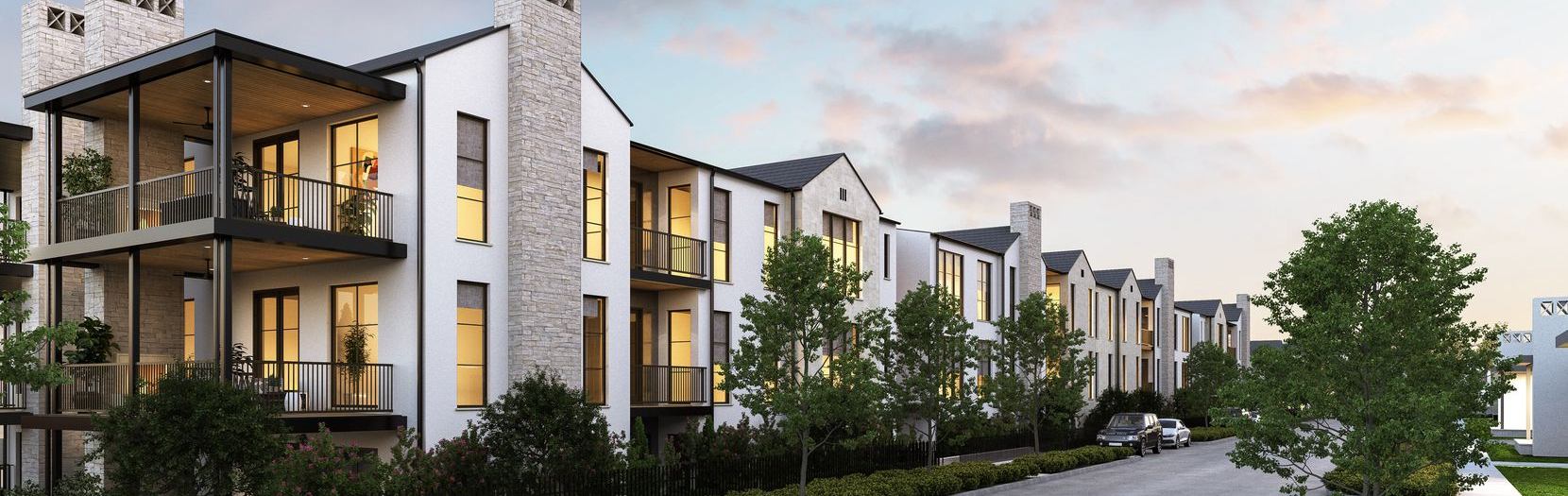 White modern apartment building with road in front