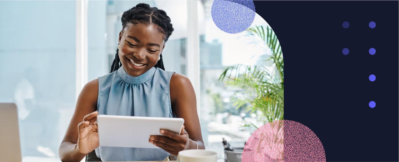 A woman performs her own research on a tablet to answer for herself, “What is credit control?”