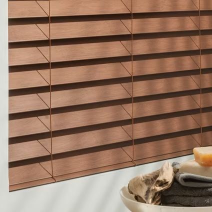 An image of faux -wood blinds