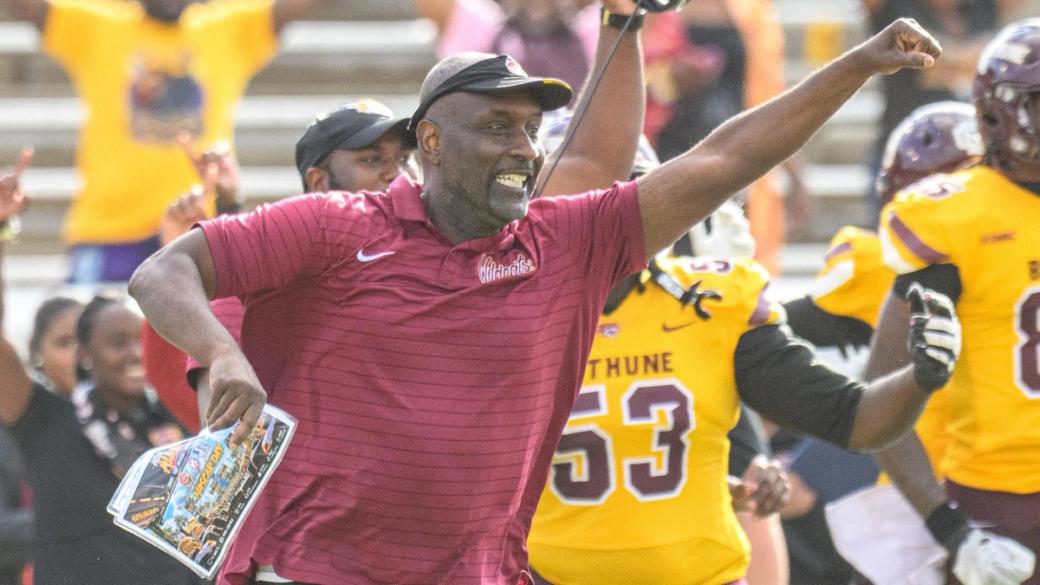 Bethune-Cookman head coach Raymond Woodie Jr. celebrates on the sideline with his players after the Wildcats' 24-21 win over No. 22 Jackson State at Daytona Stadium on October 24, 2026.