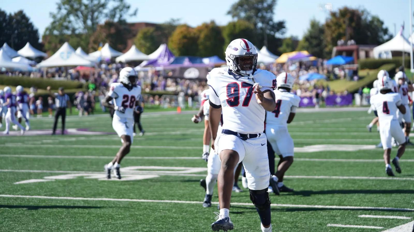 Samford defensive end Jackson Bussey celebrates during the Bulldogs' 13-6 win at Furman