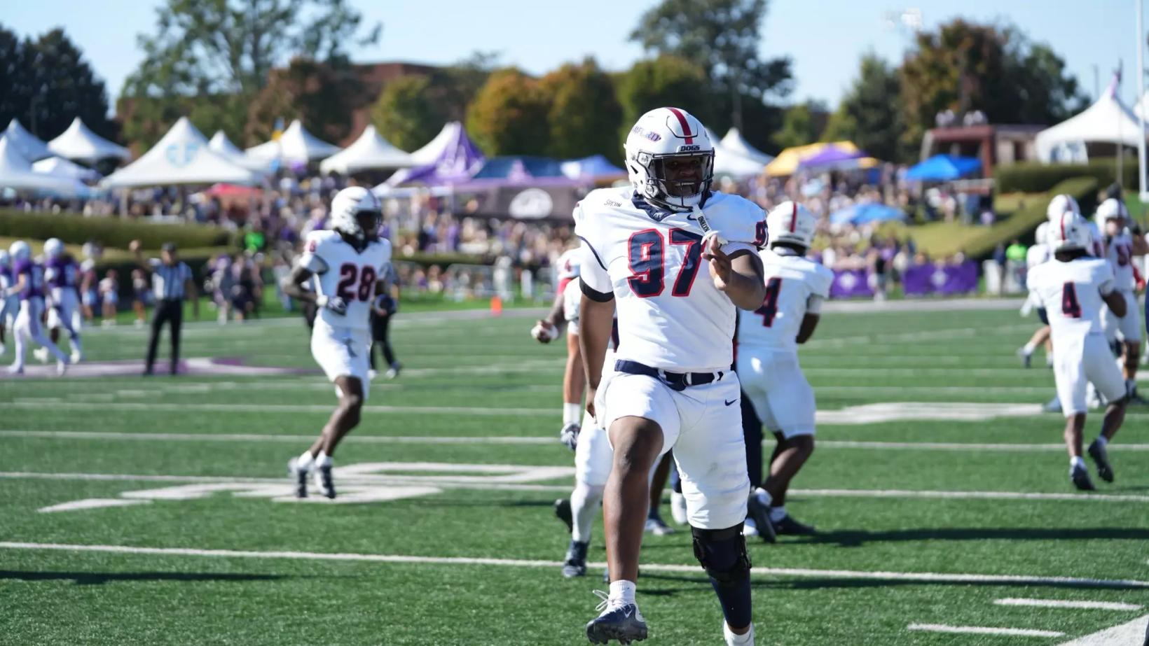 Samford defensive end Jackson Bussey celebrates during the Bulldogs' 13-6 win at Furman