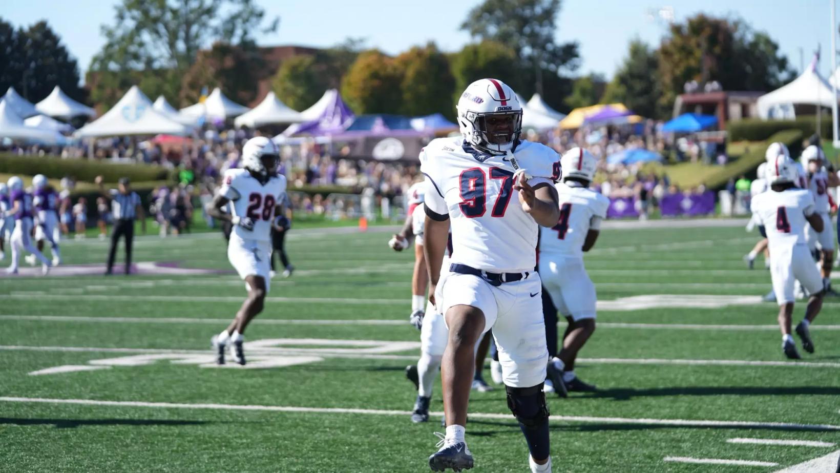 Samford defensive end Jackson Bussey celebrates during the Bulldogs' 13-6 win at Furman