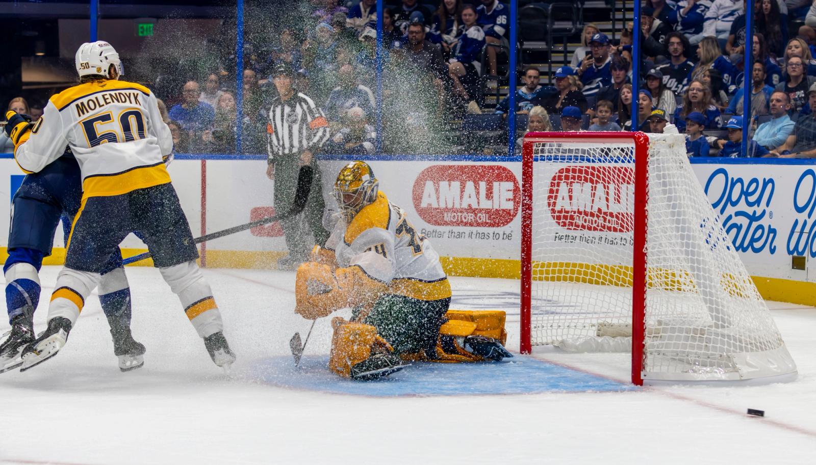 Nashville Predators goalie makes a butterfly save with ice spray — Photo Credit: Samantha Diane/Undrafted