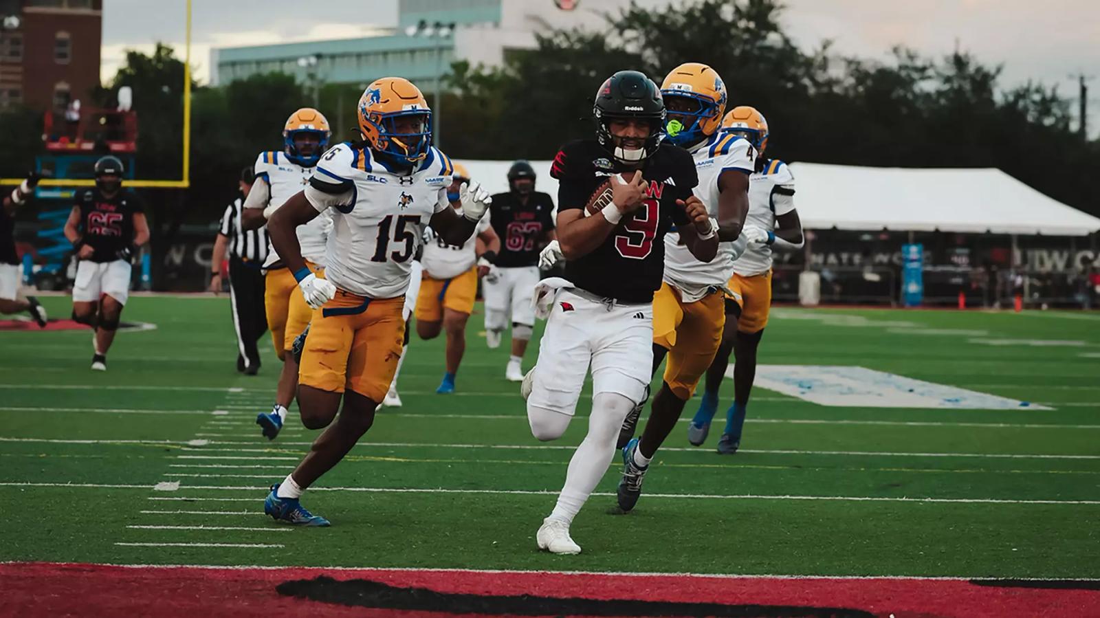 UIW quarterback Emmett Brown (9) carries the ball toward the end zone ahead of McNeese defenders at Benson Stadium during UIW's 38-6 win on Oct. 24, 2026