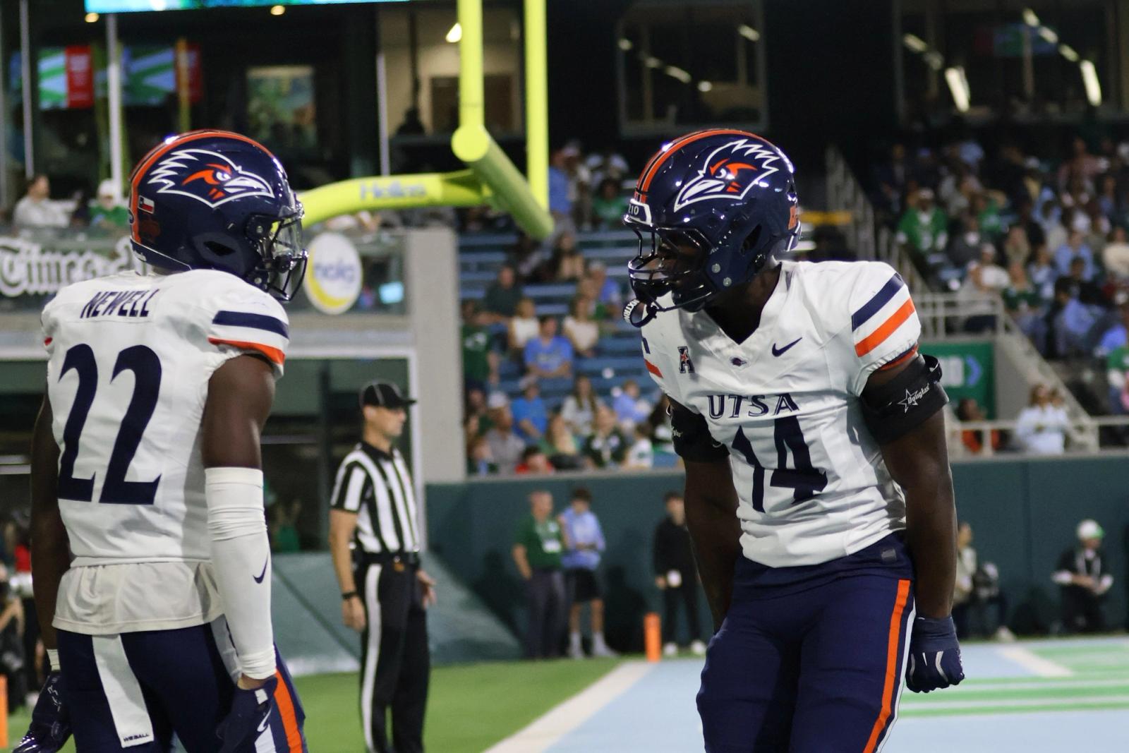 UTSA players Nos. 22 and 14 stand near the goal post during the Roadrunners' game at Tulane on October 24, 2026.