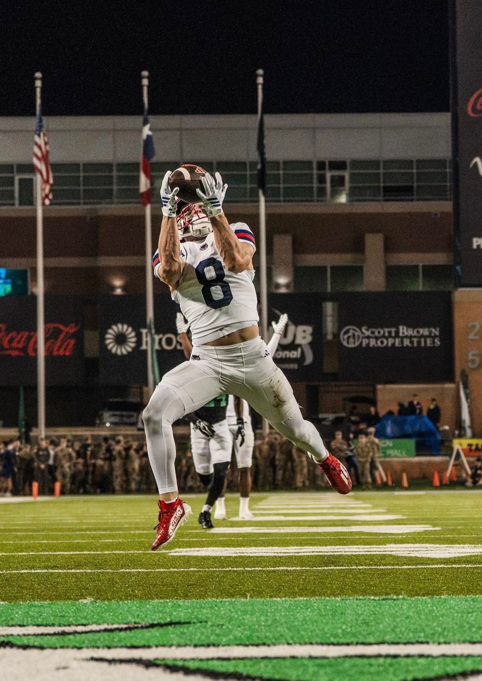 FAU receiver Easton Messer catches a touchdown pass during the Owls' 48-41 loss at North Texas on Oct. 29, 2026, at DATCU Stadium in Denton, Texas.