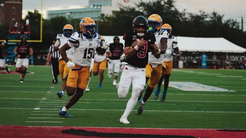 UIW quarterback Emmett Brown, wearing No. 9 in a black jersey, carries the ball against McNeese on Oct. 24, 2026 (file photo)
