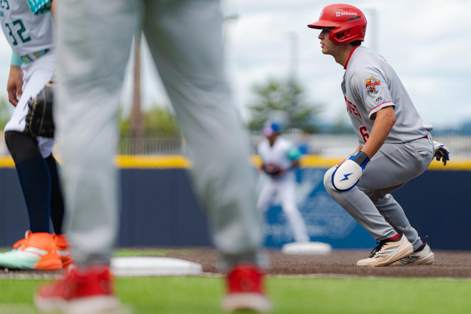 Late-game / celebration action — Vancouver Canadians vs Hillsboro Hops — Photo Credit: Aaron Leopold/Undrafted