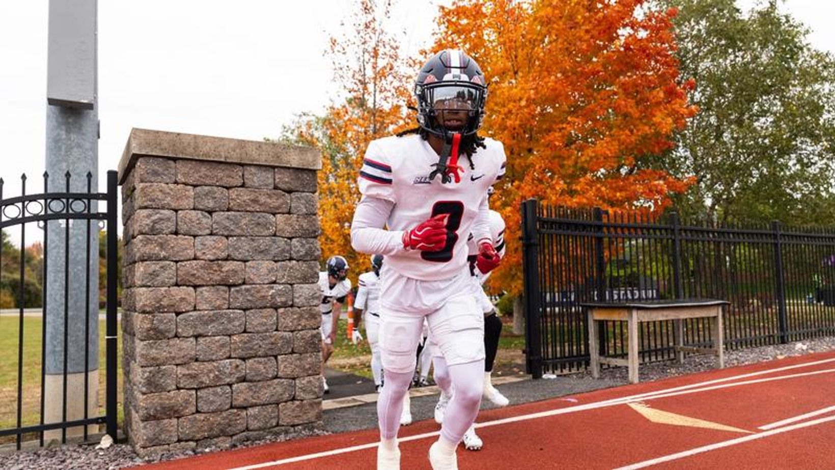 Duquesne football players take the field at Stonehill earlier in the 2026 season, used with the Dukes' 41-14 win at New Haven on Oct. 31, 2026
