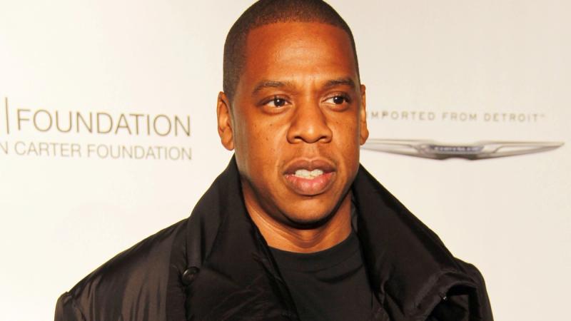 Jay-Z in a black coat at a Shawn Carter Foundation event in 2011.
