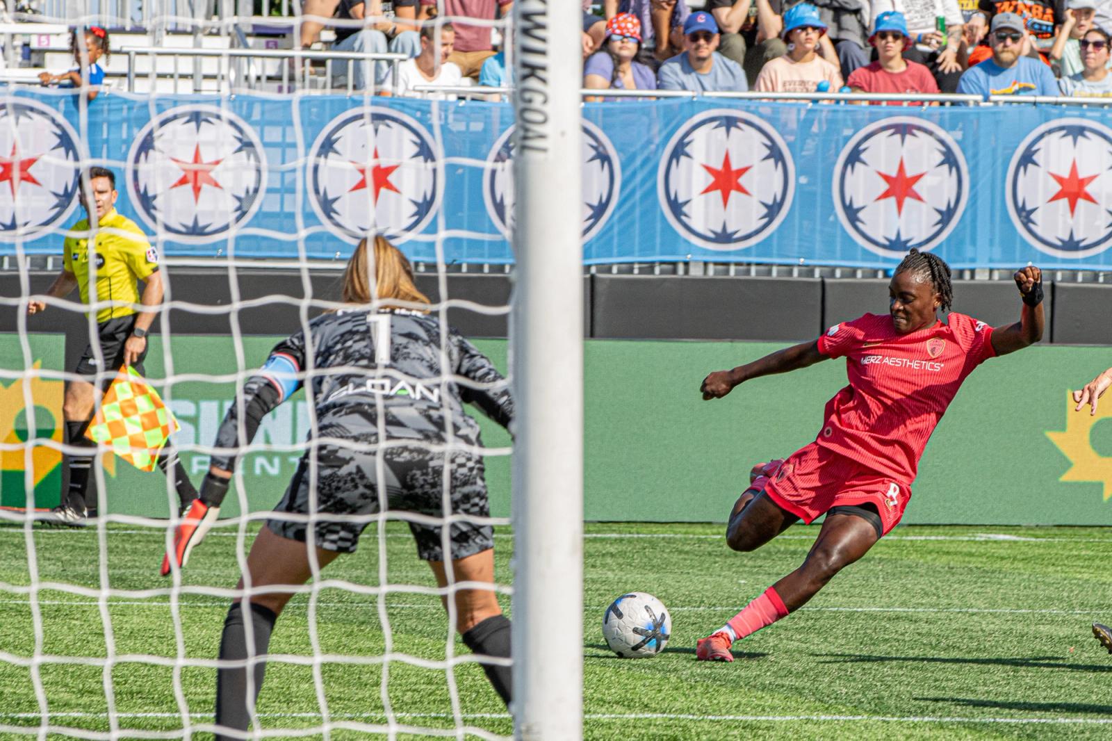 A North Carolina Courage attacker shoots past Chicago Stars FC goalkeeper Sloan during the September 6, 2026 match at Martin Stadium in Evanston, Illinois.
