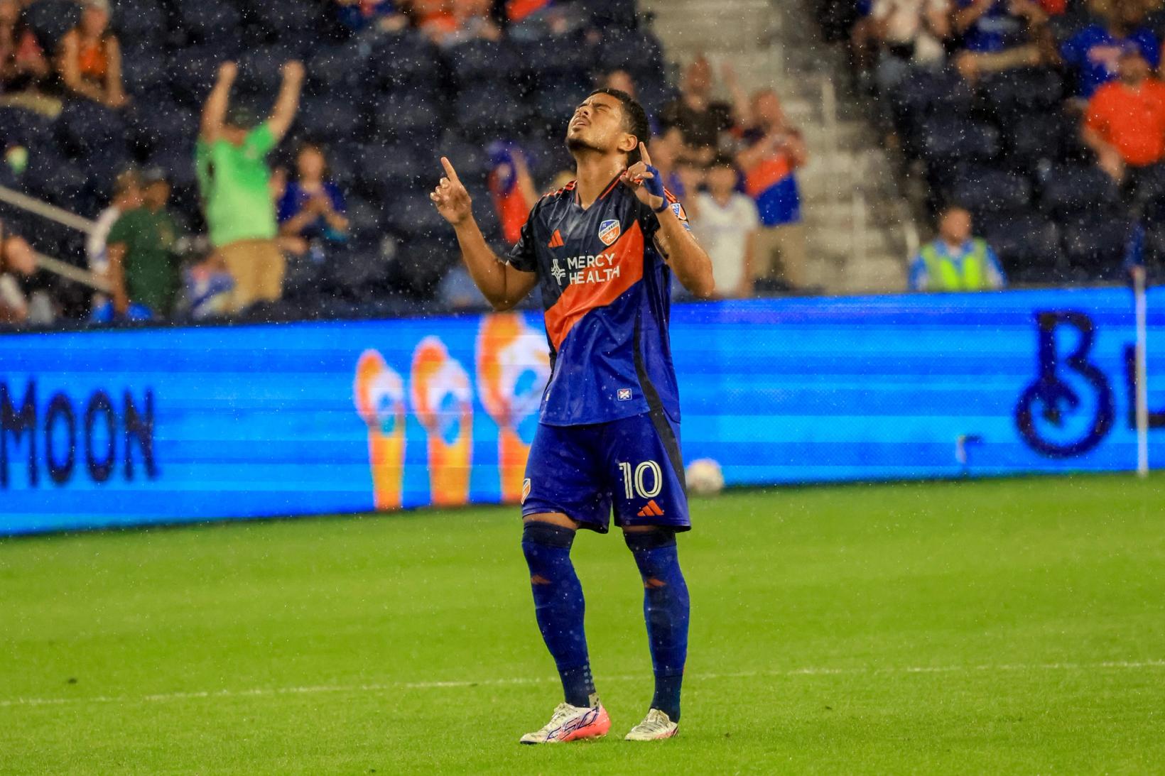 FC Cincinnati's Evander celebrates his stoppage-time winning goal against New York City FC in the rain during the August 19, 2026 match at TQL Stadium.