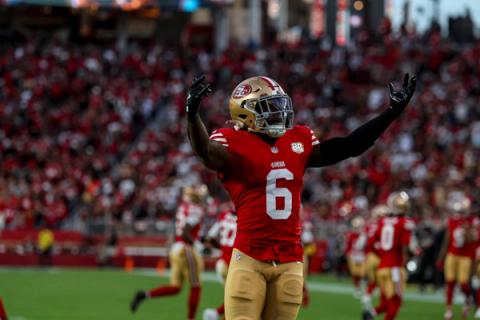 San Francisco 49ers safety Malik Mustapha (6) raises both arms toward the crowd at Levi's Stadium.