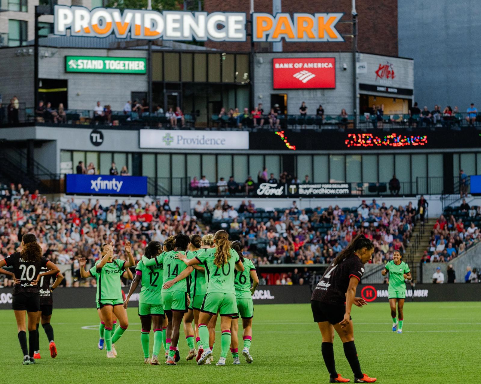 Boston Legacy players huddle in celebration at Providence Park — Photo Credit: Aaron Leopold/Undrafted