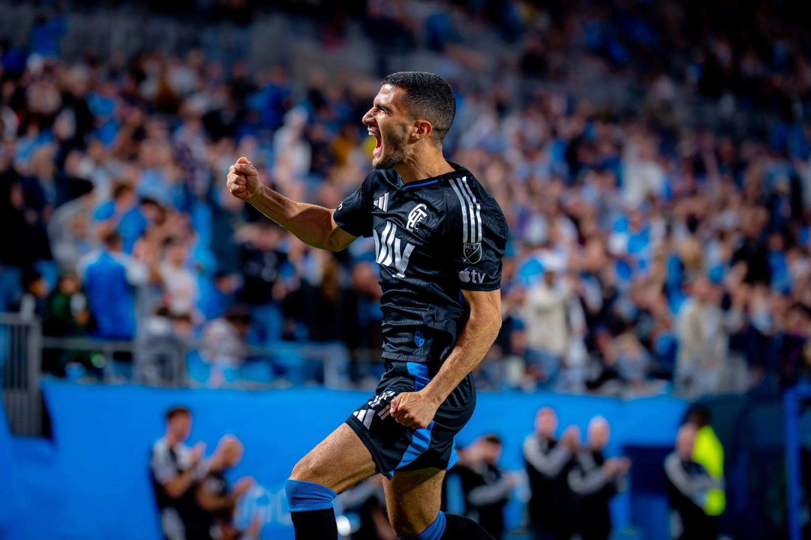 A Charlotte FC player celebrates a goal in front of the home crowd against CF Montréal at Bank of America Stadium — Photo Credit: Arturo Rosales Sevilla/Undrafted