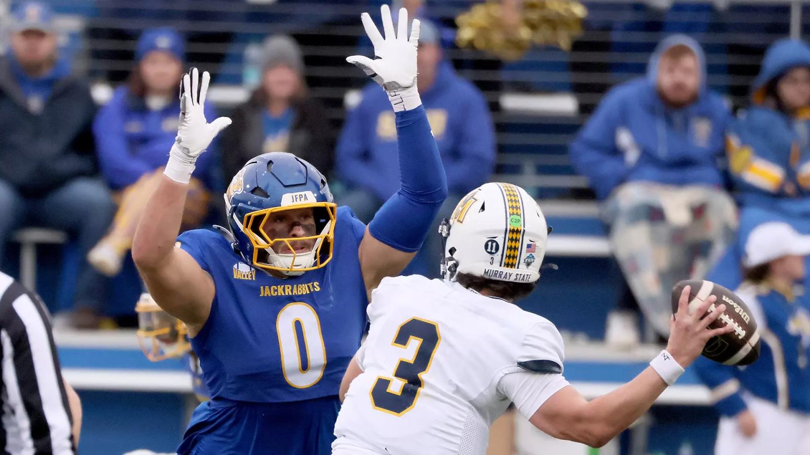 South Dakota State defensive end Carter Sitzman (0) pressures Murray State quarterback Baxter Wright (3) during South Dakota State's 42-9 Hobo Day win on Oct. 24, 2026, in Brookings.