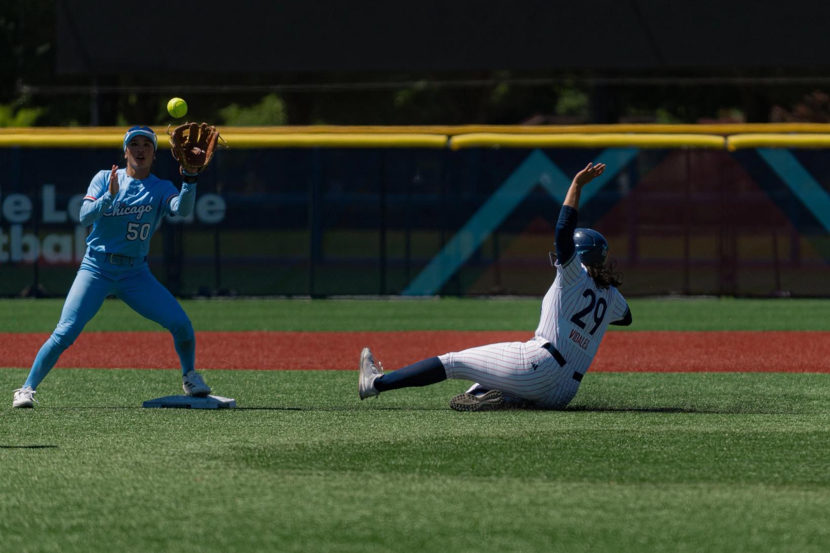 A Portland Cascade runner slides into the base as a Chicago Bandits fielder takes the throw during the July 12, 2026 game at Hillsboro Ballpark in Hillsboro, Oregon.